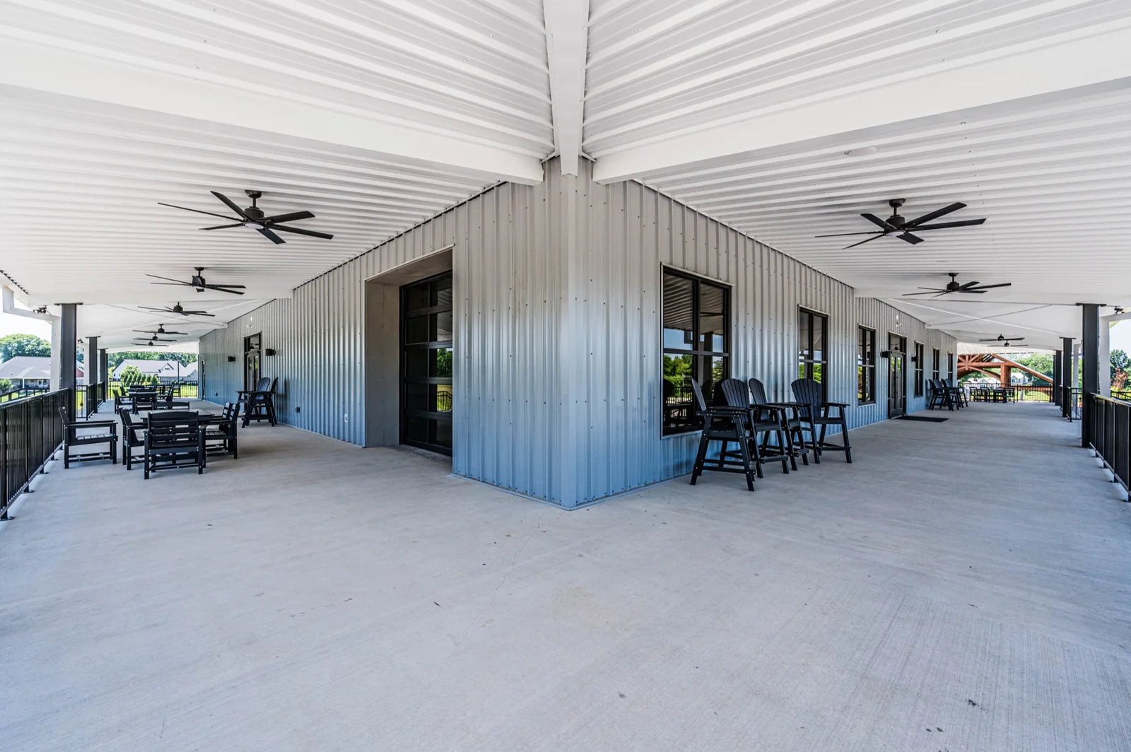 Wide view of the covered wraparound patio at Purple Toad Winery in Bowling Green